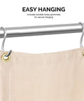 Close-up of 6 Foot By 8 Foot Fiberglass Welding Blanket With Brass Grommets, Flame Retardant Fireproof Shield hanging on a rod