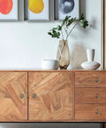 Wooden cabinet with antique bronze cabinet knobs and drawer pulls set with anchor and rudder nautical theme, matte bronze finish.