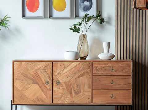 Wooden cabinet with antique bronze cabinet knobs and drawer pulls set with anchor and rudder nautical theme, matte bronze finish.