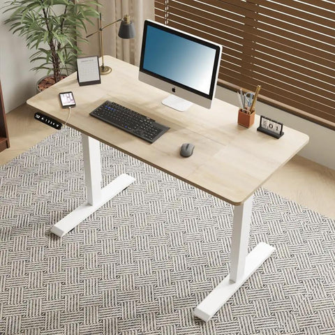 Rock Your Home Office With This Heavy Duty Electric Standing Desk In Rich 48 Inch Oak Finish, showing a sleek setup with monitor and keyboard.