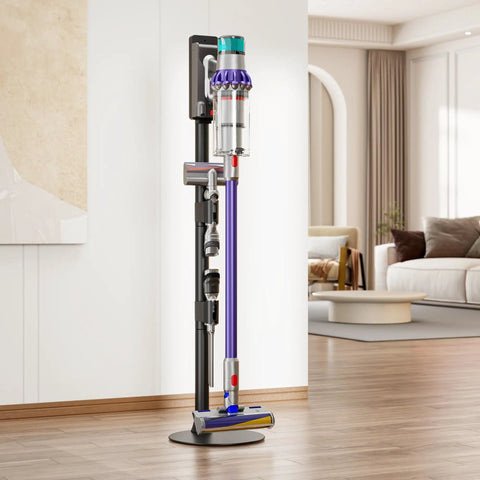 Boss Grade Steel Vacuum Stand For Cordless Vacuums in a living room, holding a Dyson V-series with accessories, black finish.