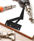 Spring Loaded Cabinet Hinge Pair For Lift Doors And 85-Degree Vertical Folding, black hinge with spring on a table