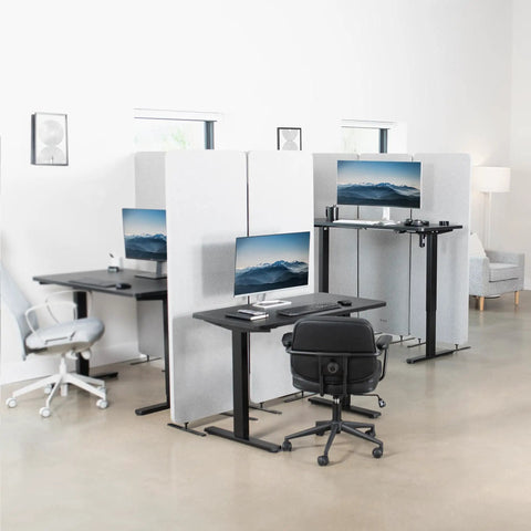 Vivo Black Height Adjustable Standing Desk 71x30 Inch Electric Sit Stand Workstation With Spacious Triple Monitor Riser Tray ergonomic setup in modern office.