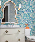 Modern Animal Print Vinyl Wallpaper Delivers Slick Leather Texture And Tough As Nails Durability For Busy Commercial Spaces And Gets Custom Printed For Your Walls in a bathroom with a mirrored vanity.