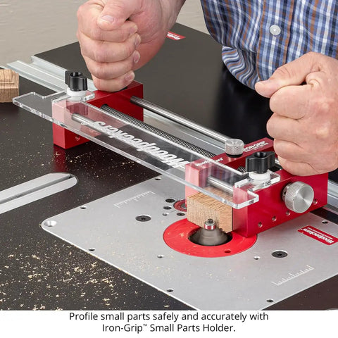 Zero Drama Small Parts Holder For Router Tables Delivers Big Time Accuracy And Rock Solid Safety For Your Shop With Heavy Duty Clamps And Precision Stop Pins For Tenons Rabbets And Dados in use with wood piece and router.