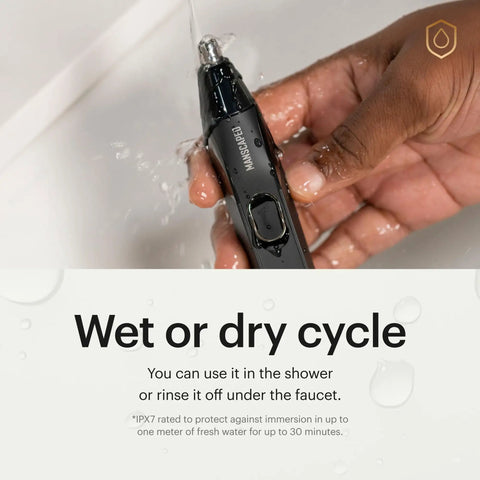 Weed Whacker 2.0 Nose And Ear Hair Trimmer With 7000 RPM Motor being rinsed under tap water, showcasing wet dry use capability.