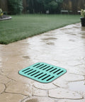 Heavy Duty Square Catch Basin With Grate For Yard Drainage 15.7 x 15.7 In installed on patio for water management