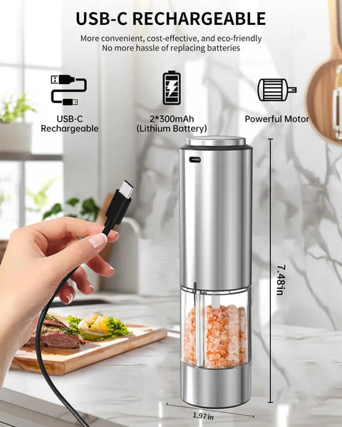Electric Pepper Grinder Stainless Steel Rechargeable With External Coarseness Dial 95ml Capacity White LED Light Silver Finish For Freshly Ground Pepper On The Fly in kitchen setting, showing USB-C charging.