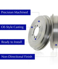 Brake drums, two silver automotive units; front- and side-view, precision machined with OE-style casting, ready to install.