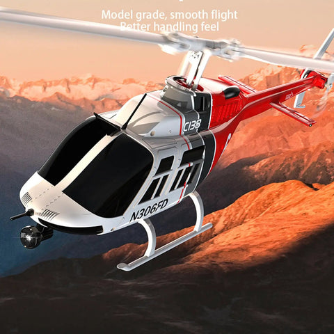 Rad Realistic One To Thirty Third Scale Bell 206 RC Helicopter flying over mountains in sunset, red and white design