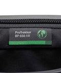 Pro Trekker BP 650 AW II Outdoor Camera Backpack With Weatherproof Cover and logo patch close-up, black and dark grey