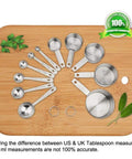 11 Piece Stainless Steel Measuring Spoons And Cups Set With Engraved Metric And Imperial Markings And Stackable Design For Everyday Cooking Baking Dry And Liquid Ingredients Great Gift, overhead on wooden board