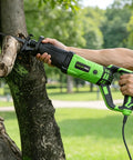 Using 900W Reciprocating Saw with Variable Speed and LED Work Light on tree branch, adjustable angle, 3000 SPM, 22mm stroke
