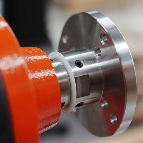 Close-up of Pack Of Six Slick Anti Lock Spindle Washers tailored for 1-1/4 inch woodlathe threads on a machine spindle.