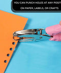 Two Pack One Quarter Inch Hole Punch For Paper Crafts handheld circle punch in use on orange paper