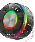 Round black Portable Waterproof Bluetooth Speaker With HD Sound And Lit LED Display IPX7 Shower Speaker With Bluetooth 5.4 RGB Lights Hands Free Calling Suction Cup For Bathroom Sing Along And Stocking Stuffers, featuring water splashes and LED lights.