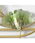 Close-up of a decorative leaf design on a Heavy Duty Wall Mounted Coat Rack With Sturdy Hooks For Draping Jackets Hats And Outerwear.
