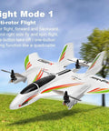 Pro Level RC Airplane For Adults, 2.4G 6CH Glider with 3 Flight Modes and LED Lights in multi-rotor flight mode over grass field.