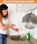 Person using Flexible Sink Grabber Reacher Tool With Four Claws Retractable Clean Claw to remove item from kitchen sink drain.