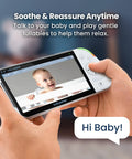 Close-up of a Full HD 5.5 Inch Split Screen Baby Monitor With Two Cameras in hand showing baby image on screen.