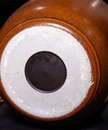 Bottom view of Hella Durable Ceramic Cereal And Rice Dispenser With Seamless Airtight Lid, showcasing its sturdy design.