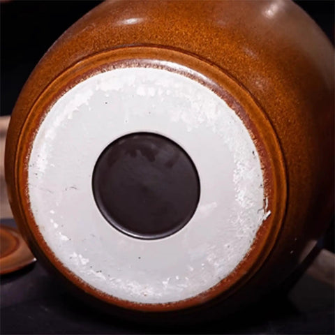 Bottom view of Hella Durable Ceramic Cereal And Rice Dispenser With Seamless Airtight Lid, showcasing its sturdy design.