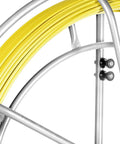 Close-up of yellow Fiberglass Fish Tape Reel for flexible wire and cable run through walls, ideal for electrical installations.