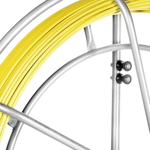Close-up of yellow Fiberglass Fish Tape Reel for flexible wire and cable run through walls, ideal for electrical installations.