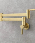 Brushed Gold Wall Mount Pot Filler Faucet With Folding Reach And Brass Construction Sixteen Point Seven Inch Extension Single Hole Install For Hot Or Cold Water Fast Fill Near Stove Easy Reach Kitchen Upgrade, mounted on wall