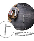 Heavy Duty Spring Plunger Pin With Indexing Lock For Cabinets And Shop Gear, steel pin on wooden surface beside wrench and gloves.