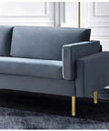 Built Different Heavy Duty Aluminum Desk Legs Featuring Adjustable Furniture Feet For Sofas Tables And Beds Crushes The Weight Perfectly on a gray sofa.