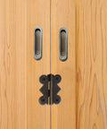 Iron vintage butterfly hinge installed on a wooden cabinet door, part of 20 Pack No-Fuss Vintage Butterfly Hinges For Cabinets And Small Wood Boxes Iron Material Sturdy Easy Install Hardware For DIY Home Improvement And Furniture Restoration.
