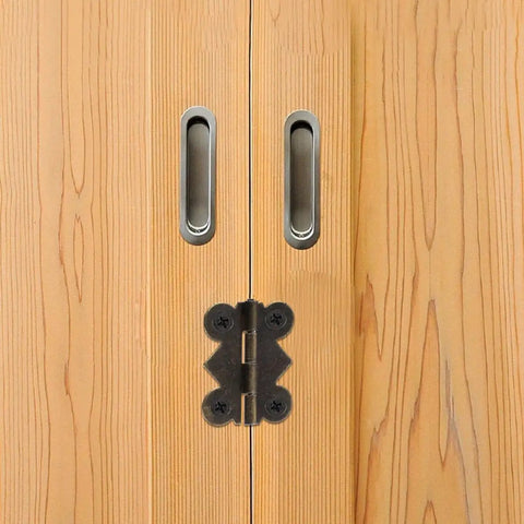 Iron vintage butterfly hinge installed on a wooden cabinet door, part of 20 Pack No-Fuss Vintage Butterfly Hinges For Cabinets And Small Wood Boxes Iron Material Sturdy Easy Install Hardware For DIY Home Improvement And Furniture Restoration.