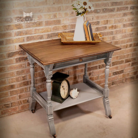 Table painted with Sawmill Gravy Chalk Mineral Furniture Paint 32oz Matte Beige Finish, displayed against brick wall.