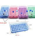 Colored racks with silicone pads for 5-15ml tubes, 18mm holes, featuring focus keyword: Pink 50 Hole Plastic Test Tube Rack With Silicone Pad Bottom Detachable Holder For 5ml 10ml And 15ml Centrifuge Tubes 18mm Hole Diameter Lab Organizer For Secure Tube Storage
