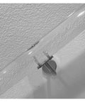Get Ready To Level Up Your Space With This Epic Custom Acrylic Handrail Kit For Stairs Featuring Crystal Clear Lucite, Rock Solid Iron Brackets Supporting 440 Lbs Each, And A Grippy Non Slip Surface - close-up of mounting bracket and acrylic tube.