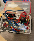 Toolbox with various tools, including a 7 Inch Wire Rope Cutter for Railing and Cable Installations with Induction Hardened Blades.
