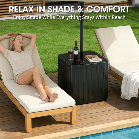 Outdoor Umbrella Side Table With Hole 2 In 1 Square Patio Table For Poolside And Deck Includes 15.9 Gallon Fillable Base Fits Up To 1.5 Inch Pole Matte Black Space Saving Durable And Easy To Set Up near lounge chairs by a pool.