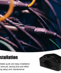 Heavy Duty Black Plastic Cable Clamps Plug And Play Wire Fasteners For Electrical Panels And Power Cords No Fuss Slick Mounting close-up with wires.