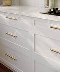 Champagne Bronze Go-To Cabinet Drawer Pulls 5 Pack For Kitchen Cabinets And Dressers Modern Aluminum Handles on white drawers