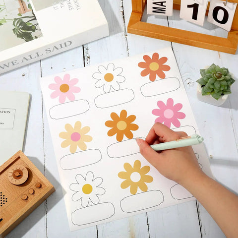 Retro Groovy Floral Name Tag Stickers With Daisy Flower Nameplates for Back To School Classroom, hand writing on a sticker sheet