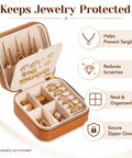 Super Chic Travel Jewelry Box With Waterproof PU Leather Exterior And Soft Flannel Interior Removable Dividers, open showing organized rings and earrings.