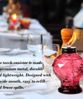 Red Four Pack Glass Table Top Outdoor Torches With Citronella Refillable Glass Lanterns on dining table at patio party