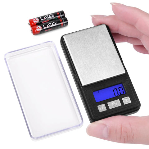 Ultra Mini Pocket Scale 1000G Capacity With 0.1G Increments and clear LCD display, shown with tray and batteries, ideal for portable use