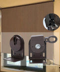 Universal Aluminum Alloy Mounting Brackets For Cordless Crank Roller Replacement, DIY Friendly Install, displayed against window