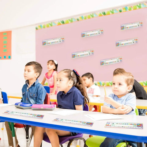 Children using 36 Piece Classroom Name Plates For Desks With Alphabet And Math Labels Multipurpose Manuscript Name Tags