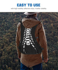 Person wearing Go To Hydration Backpack For Running Cycling And Hiking With Quick Access Water Bladder Lightweight Reflective Gear