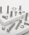 Assorted stainless steel bolts, nuts, and washers from SAE 232-Piece 1/4-20 Bolt And Nut Assortment Kit With Washers on white surface.