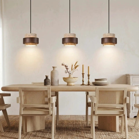 Axamate Wabi Sabi Pendant Light Natural Stone Chandeliers Dia 8" illuminating a rustic dining table with natural decor.
