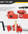 Heavy Duty Six Pack Of Half Inch Pipe Clamps For Woodworking, showing red cast iron clamps for precise wood alignment.